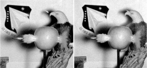 wall-eyed stereo photo of bullet piercing apple