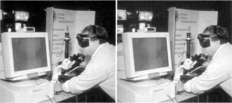 Wall-eyed stereo photo of an Employee of Digital Optical Technologies demonstrates their 3-D microscope system