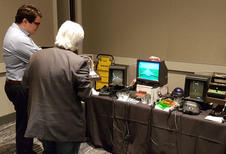 Discussions at the electronic 3D games stand showcased by Ilicia Benoit and Eric Kurland.